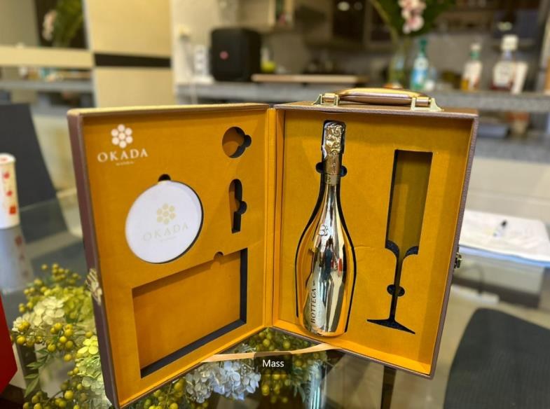 Gold-lined presentation hamper with wine service set