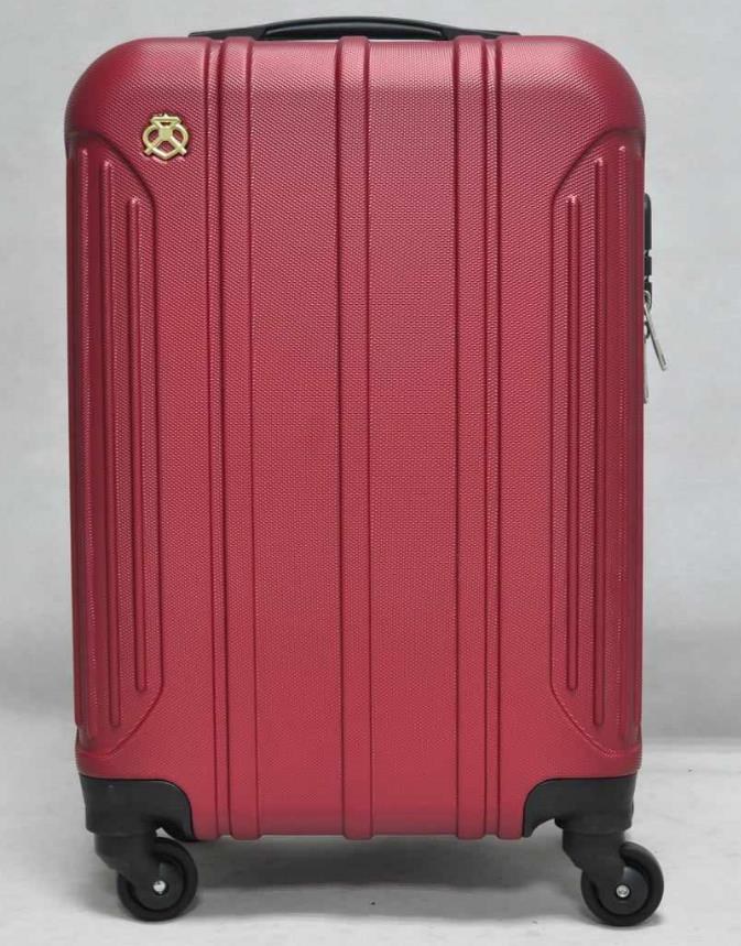 Red polycarbonate hard-shell spinner suitcase