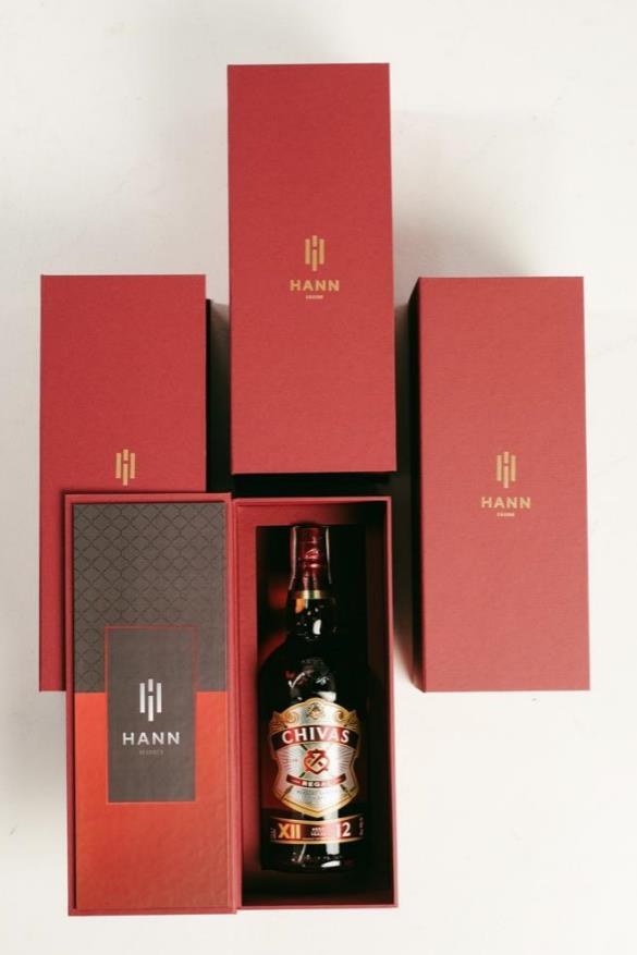 Red rigid gift boxes produced for a premium spirits launch
