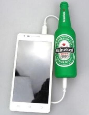 Novelty bottle-shaped power bank charging a phone
