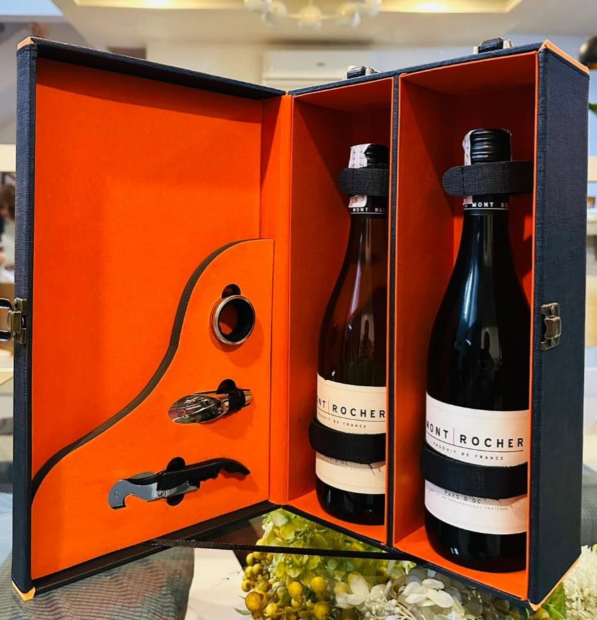 Leatherette wine trunk holding two bottles and bar tools